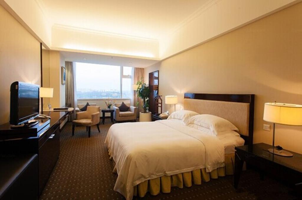 Tienyow Grand Hotel Haikou  Quarto foto