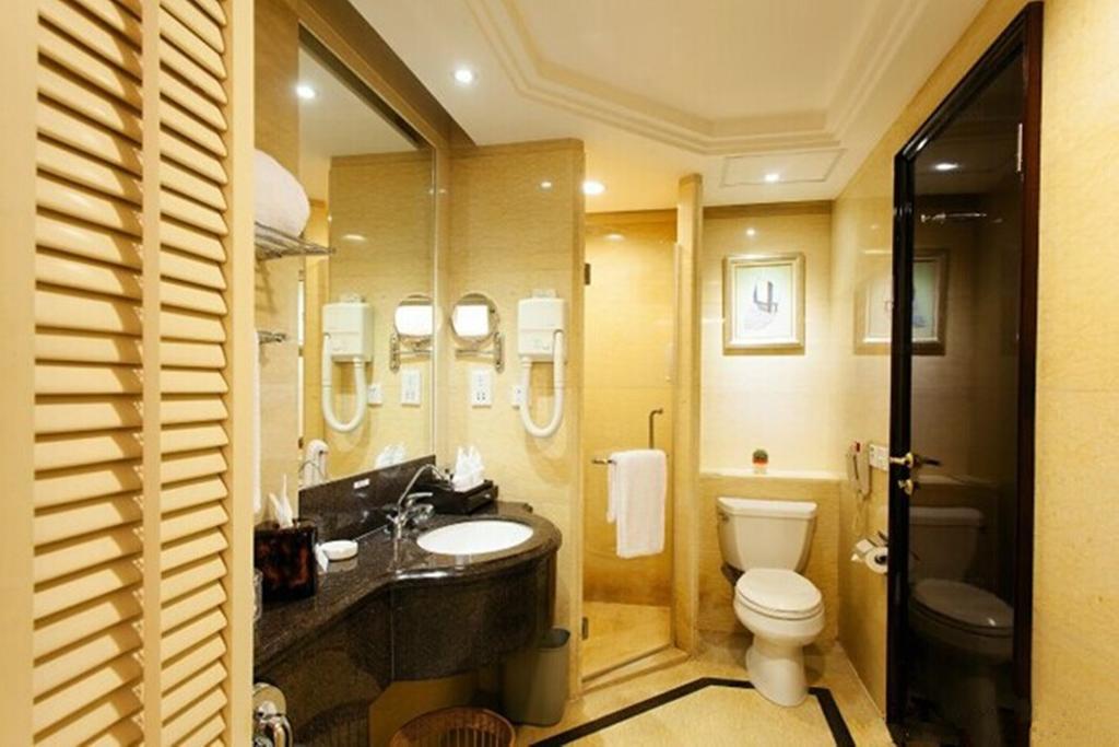 Tienyow Grand Hotel Haikou  Quarto foto