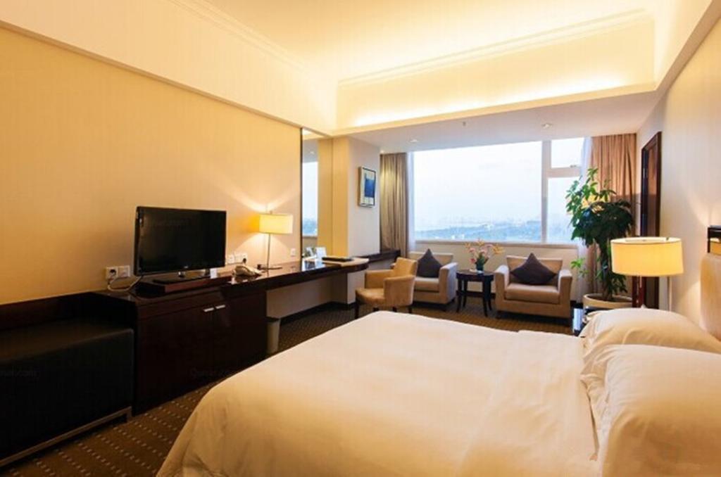 Tienyow Grand Hotel Haikou  Quarto foto