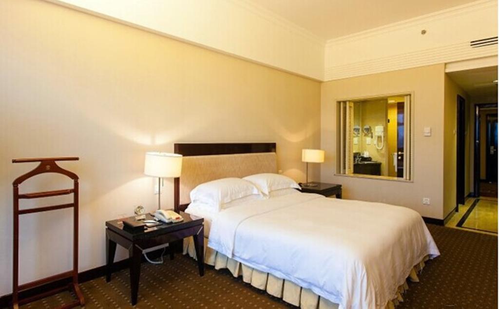 Tienyow Grand Hotel Haikou  Quarto foto