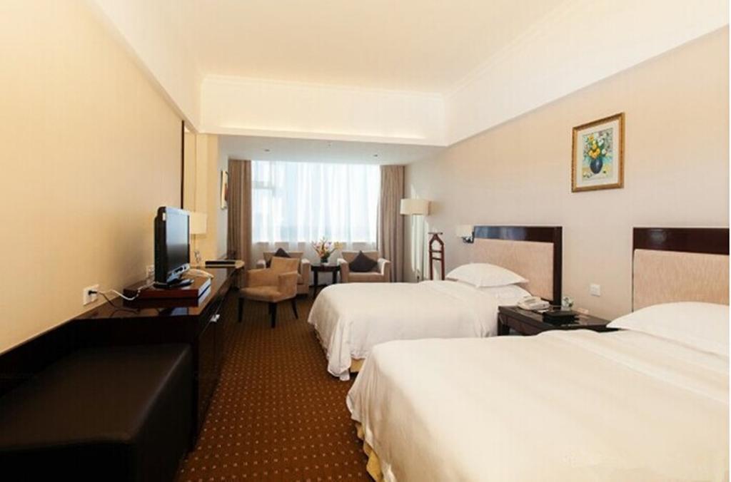 Tienyow Grand Hotel Haikou  Quarto foto