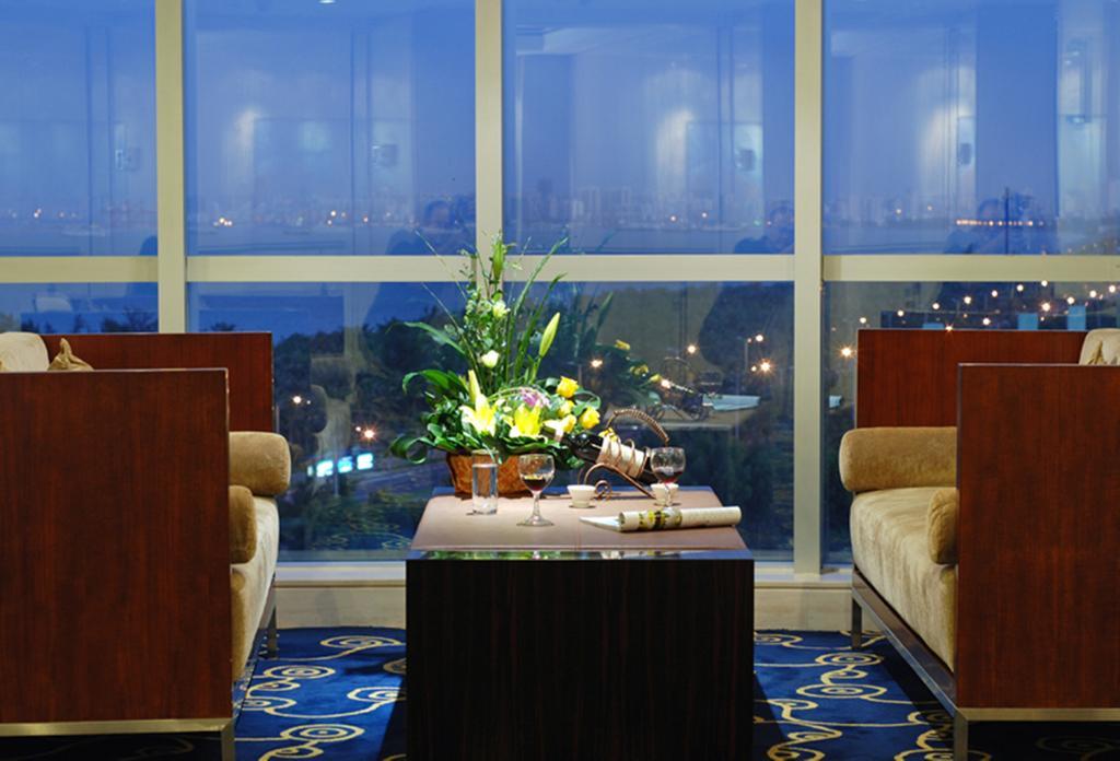 Tienyow Grand Hotel Haikou  Quarto foto