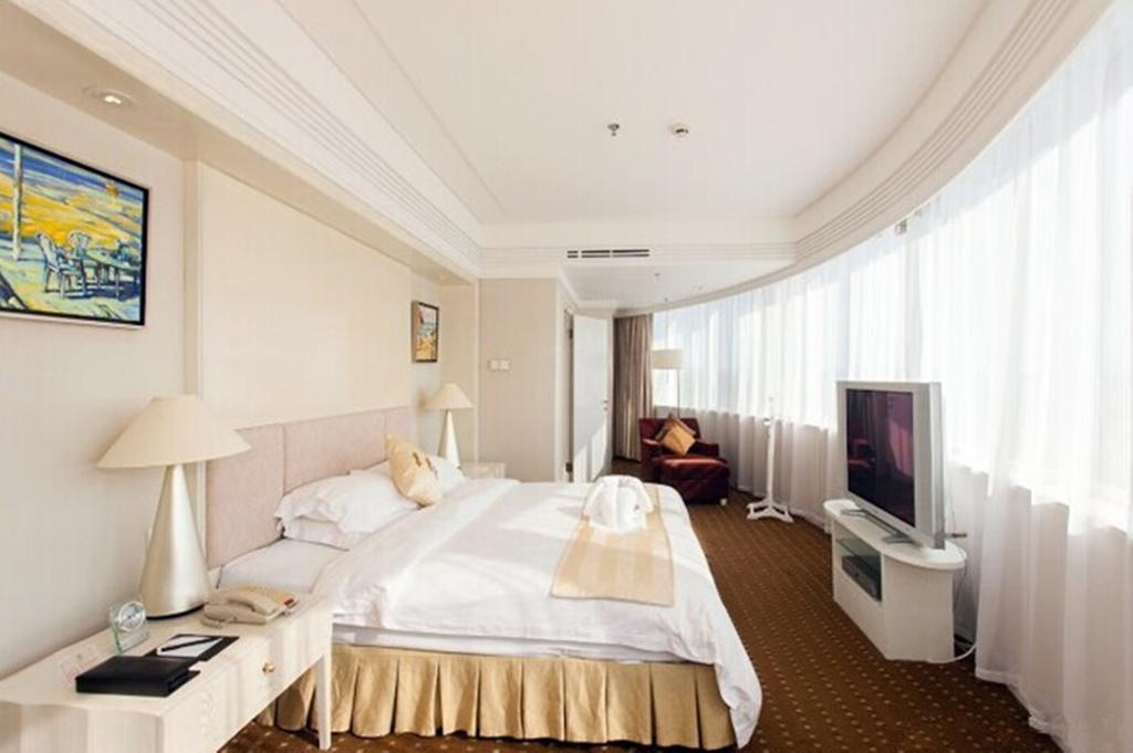 Tienyow Grand Hotel Haikou  Quarto foto