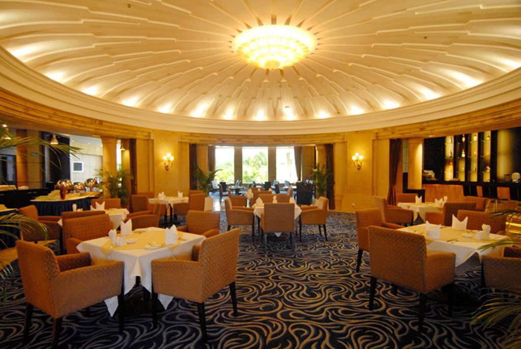 Tienyow Grand Hotel Haikou  Quarto foto