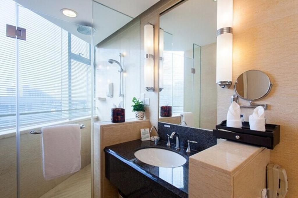 Tienyow Grand Hotel Haikou  Quarto foto