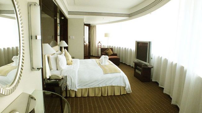 Tienyow Grand Hotel Haikou  Quarto foto