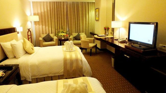 Tienyow Grand Hotel Haikou  Quarto foto