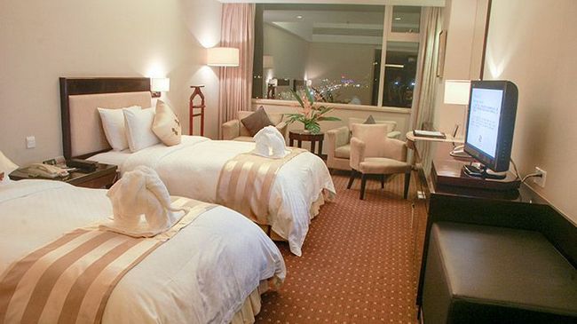 Tienyow Grand Hotel Haikou  Quarto foto